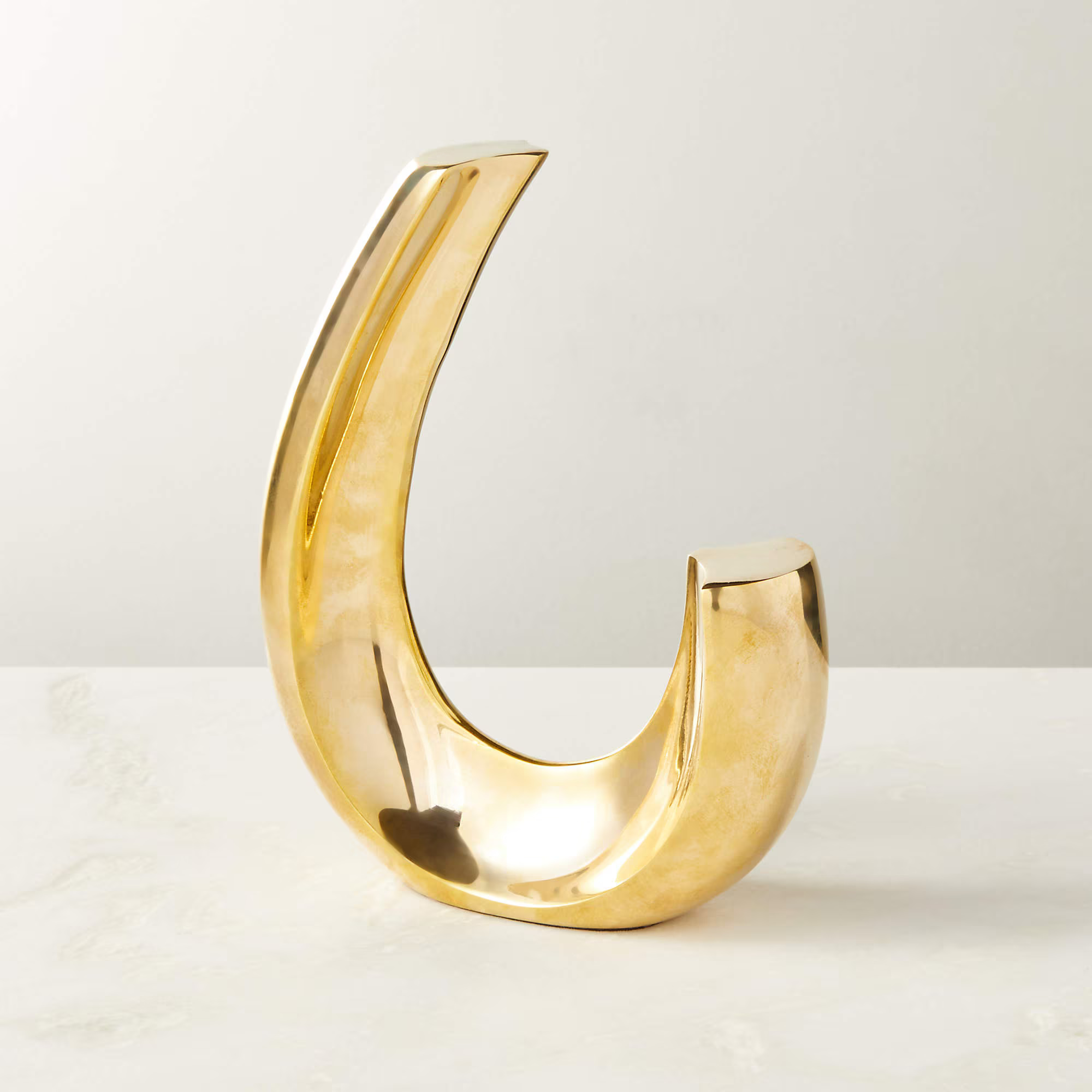 CLEF BRASS SCULPTURE BOOKEND